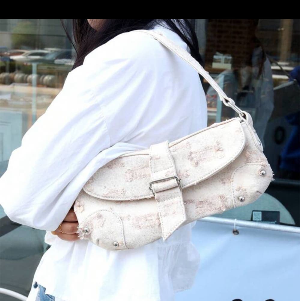 Women denim distressed asymmetric shoulder bag view 5